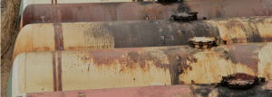 rusted underground oil tanks