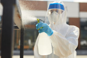 female-worker-spraying-chemicals